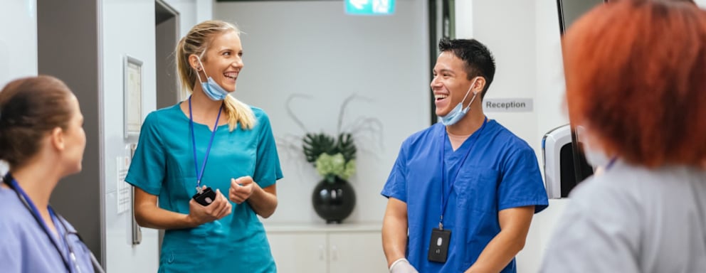 Nurses working together and smiling